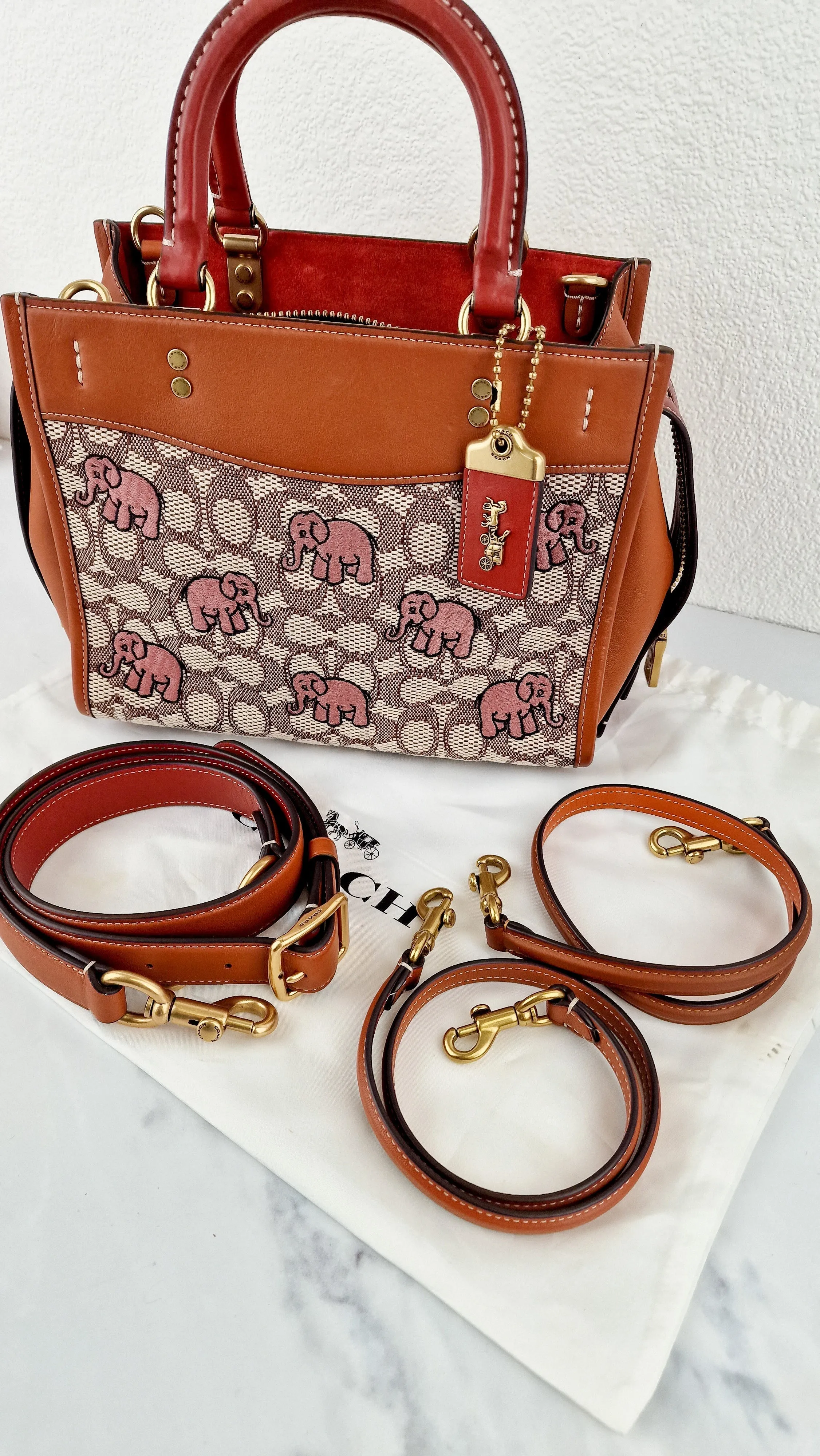 Coach Rogue 25 Signature Textile Jacquard with Embroidered Pink Elephants Handbag Coach C6165