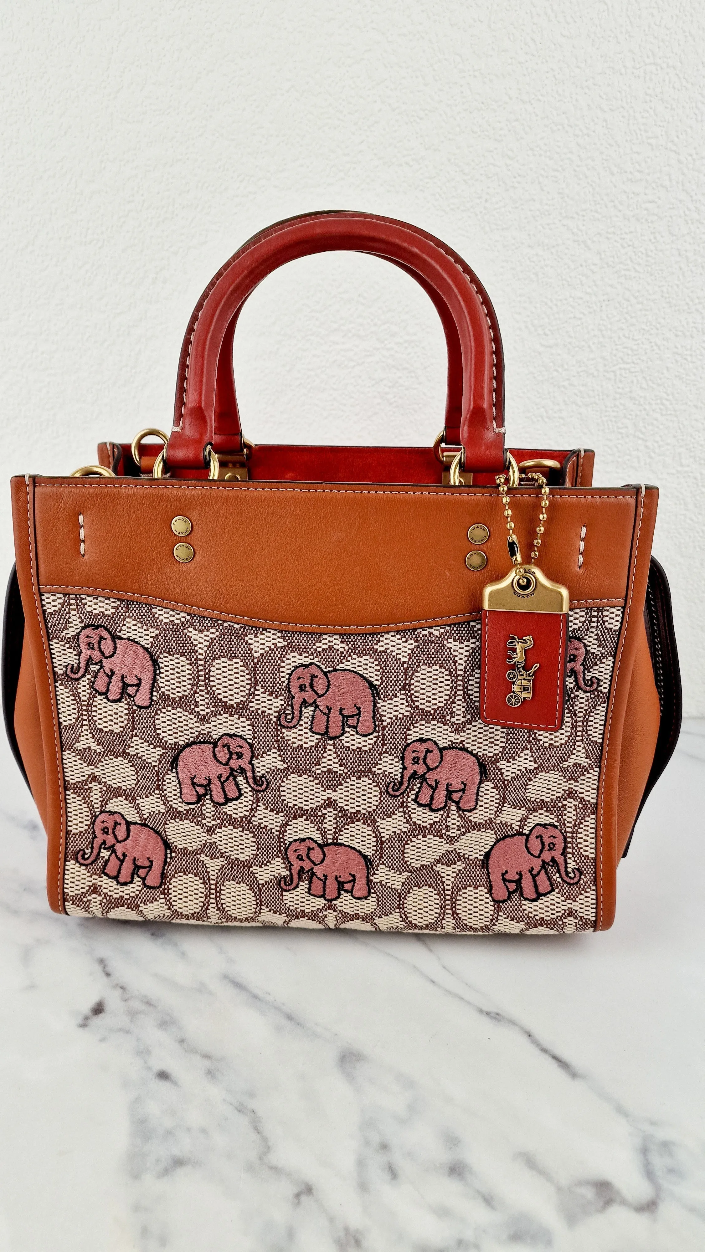 Coach Rogue 25 Signature Textile Jacquard with Embroidered Pink Elephants Handbag Coach C6165