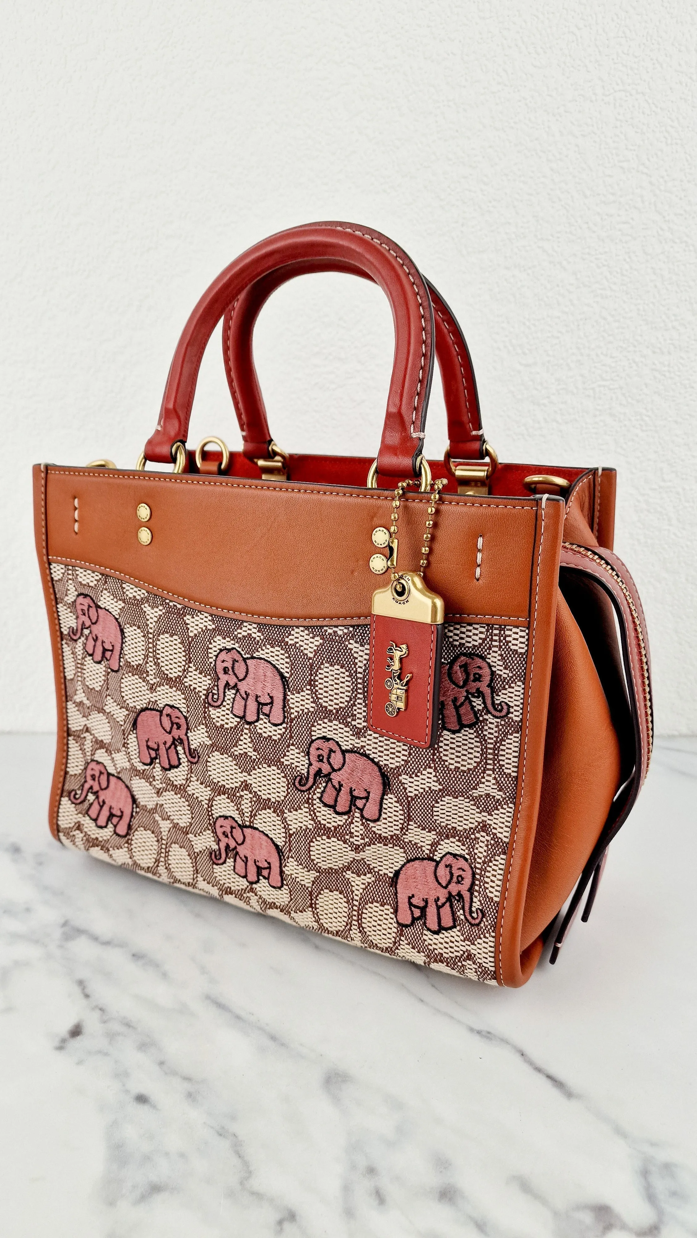 Coach Rogue 25 Signature Textile Jacquard with Embroidered Pink Elephants Handbag Coach C6165